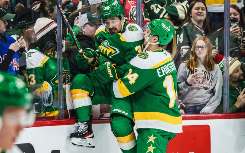 Wild clinch playoff spot with win in Vancouver